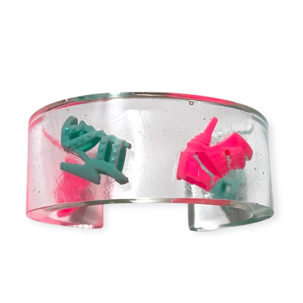Newly handcrafted. Resin Cuff Bracelet with Pink and Teal Barbie Heel Charms